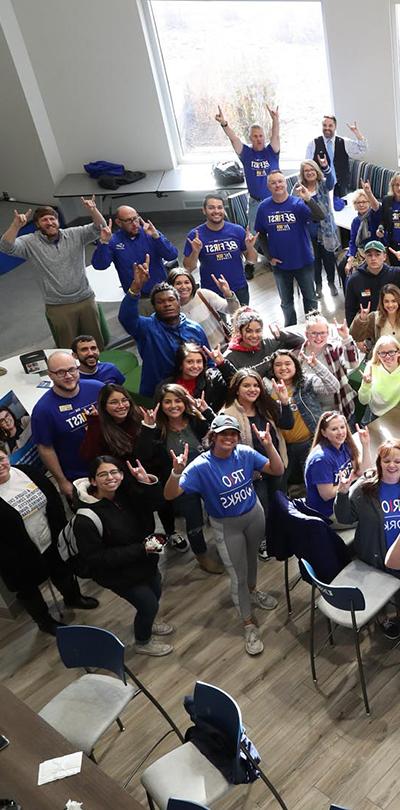 unk first gen people posing for a photo in the student union